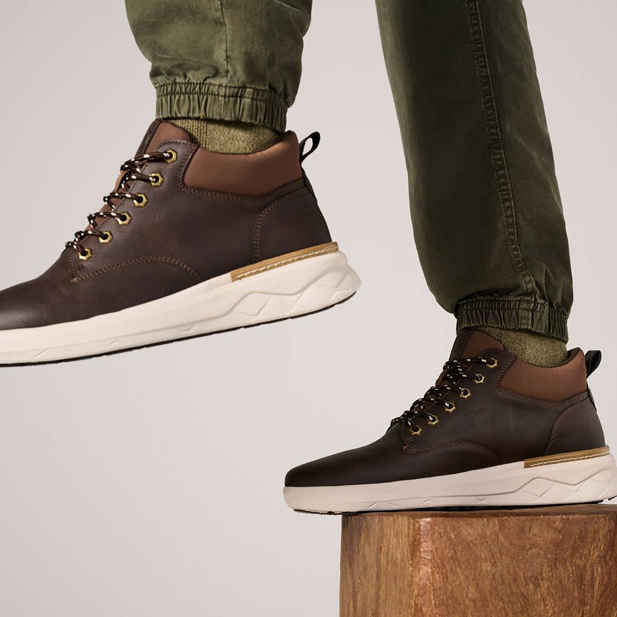 Brown leather lace-up boots. Shop footwear